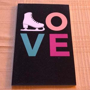 Ice skating lined notebook journal NWOT. Black cover with Love printed on cover